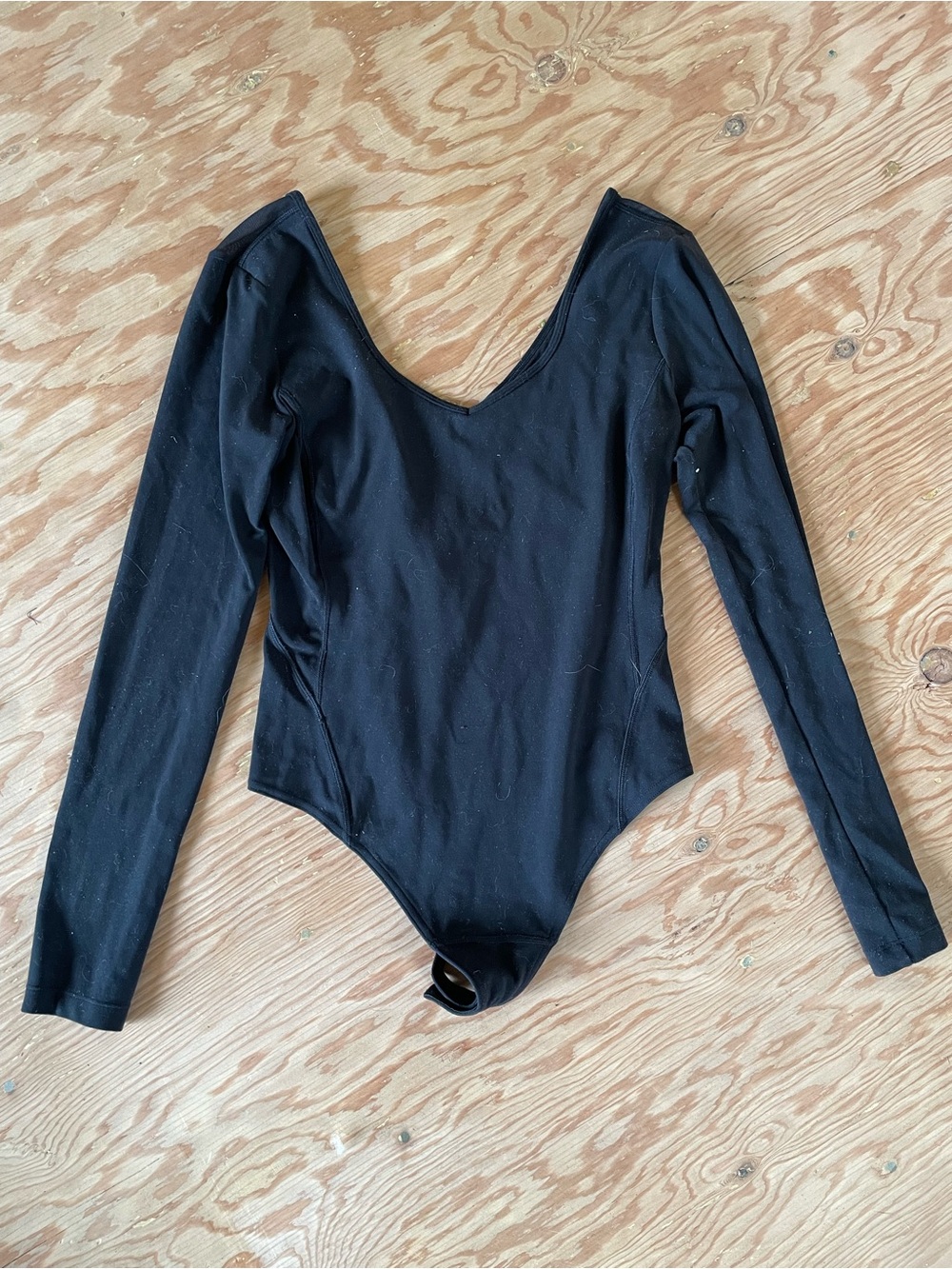 lululemon athletica Black Long-Sleeve Scoop Bodysuit with mesh back panel size 6